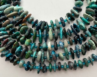 10-14mm irregular slices Chrysocolla gemstone chip beads. 16” strand of mixed blue and green slices, approx. 70-72 beads per strand.