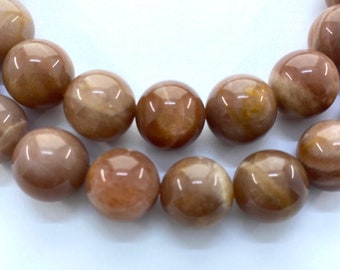 Peach Moonstone Gemstone Beads. 14mm round beads on 15 inch strand. Full strand High Quality A/AA grade beads, about 29 per strand.