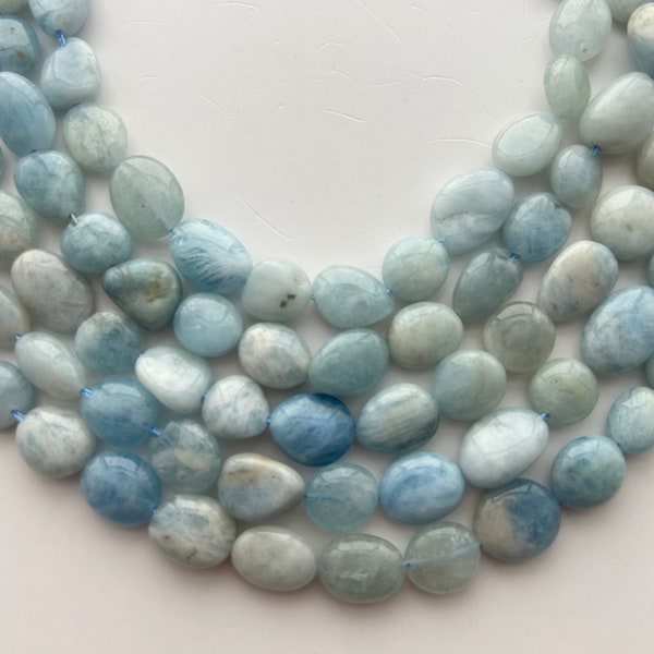 Freeform Aquamarine gemstone nuggets. 15” strand of 10-14mm nugget beads, approx. 32-34 beads per strand.