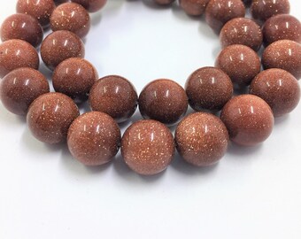 Goldstone Beads. 12mm round beads on 15 inch strand. Full strand of AAA Grade beads, 32 beads. Brown Goldstone or Sandstone. Very glittery