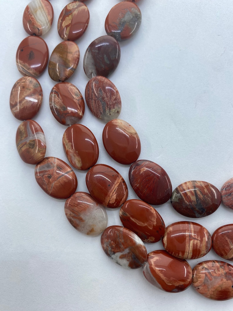 13x18mm Oval Red Bend Jasper Gemstone Beads 15\u201d strand of flat oval Jasper beads Red Jasper with orange pink and white. 22 per strand