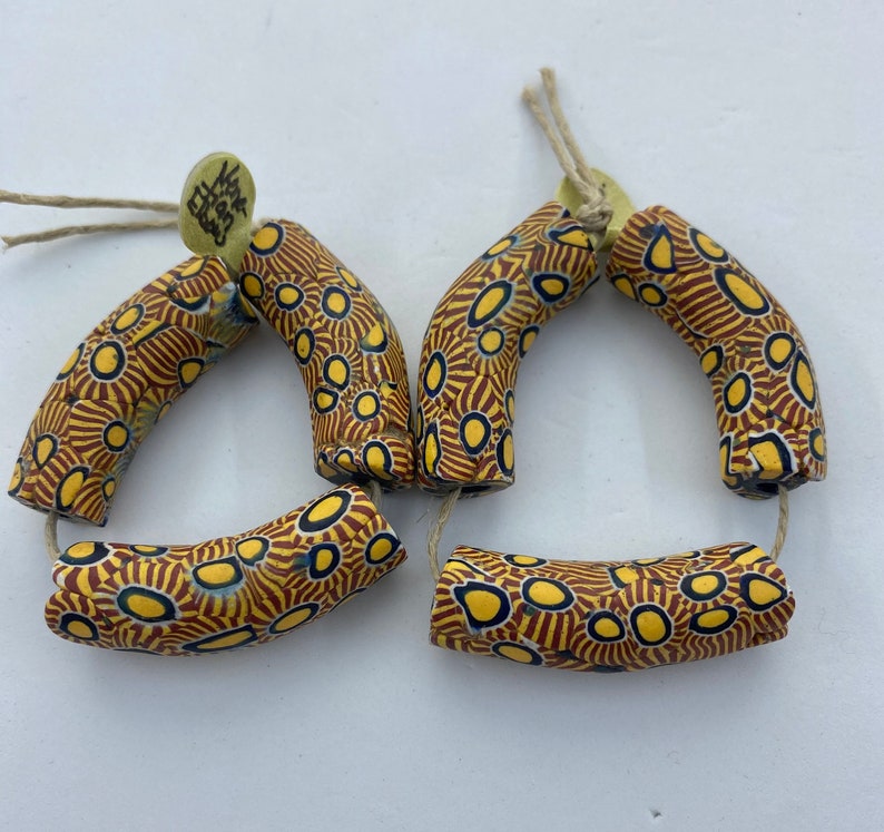 40mm in length and 12mm dia. Strand of 3 \u201celbow\u201d beads in excellent condition Approx Antique Venetian Millefiori African Trade Beads