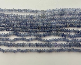 3-4mm rondelle Iolite Gemstone Beads. 15” strand of rondelle Iolite, approx. 3-4mm in diameter and 2-3mm in width.