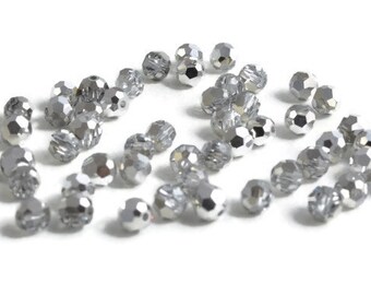 4mm Round Comet Argent SWAROVSKI® Crystal Beads #5000.  Package of 50. Special Finish Silver color Genuine Austrian Crystal.