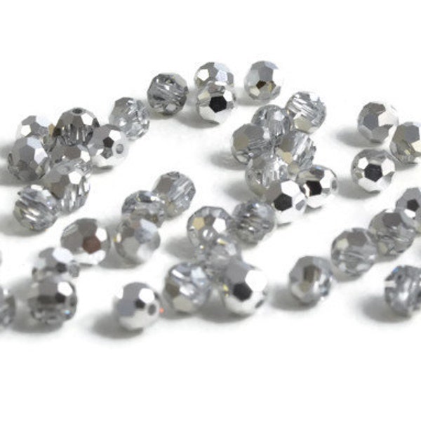 4mm Round Comet Argent SWAROVSKI® Crystal Beads #5000.  Package of 50. Special Finish Silver color Genuine Austrian Crystal.