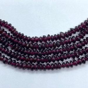 5mm Saucer Red Garnet beads.  16” strand of natural garnet saucer beads, approx. 165 per strand.
