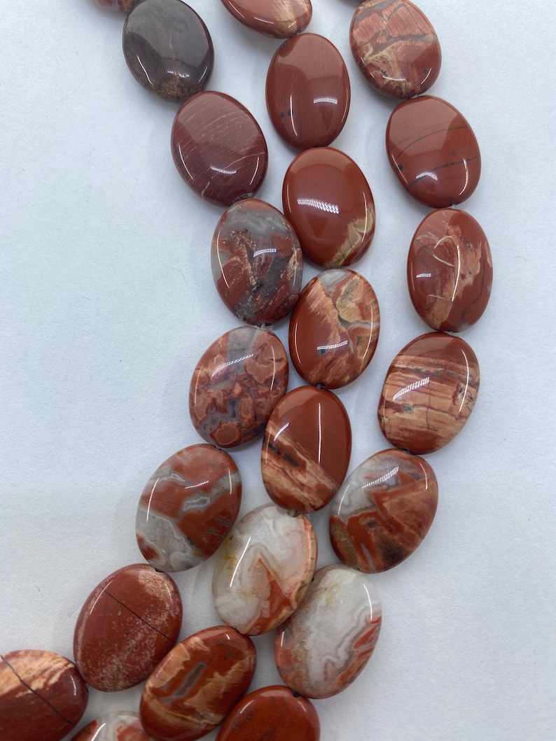 13x18mm Oval Red Bend Jasper Gemstone Beads 15\u201d strand of flat oval Jasper beads Red Jasper with orange pink and white. 22 per strand