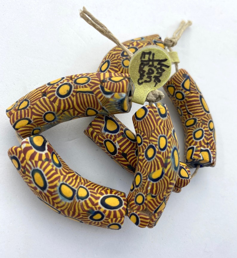 40mm in length and 12mm dia. Strand of 3 \u201celbow\u201d beads in excellent condition Approx Antique Venetian Millefiori African Trade Beads