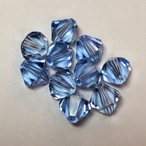 Light Sapphire 8mm Bicone SWAROVSKI® Crystal Beads #5301 package of 10.  Genuine Austrian Crystal. Bulk. #5328.  September birthstone.
