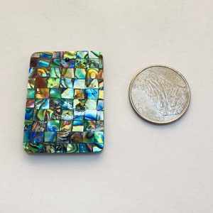 30x40mm rectangle Abalone mosaic pendants. Front drilled Abalone pendants, 4mm thick with black back. Paua Shell from New Zealand.