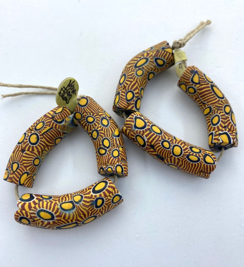 40mm in length and 12mm dia. Strand of 3 \u201celbow\u201d beads in excellent condition Approx Antique Venetian Millefiori African Trade Beads
