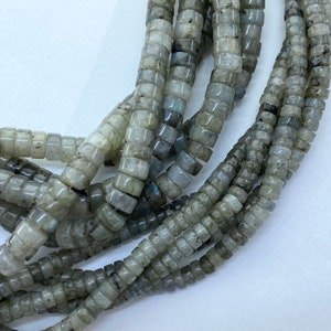 4mm and 6mm Heishi Labradorite Gemstone Beads. 15” strands of heishi cut beads. Grayish Green Labradorite.