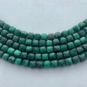 4mm Malachite precision faceted cube gemstone beads.  15&quot; strands of high quality faceted cubes, approximately 86 per strand.