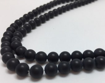 6mm Matte Black Onyx Gemstone Beads. 15" strand of round AAA grade beads, roughly 66 beads per strand.