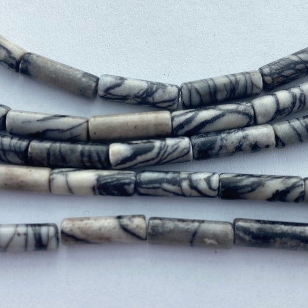 Black Wave Jasper 4x13mm tube shaped beads. 15” strand of tube beads, 29 beads per strand. Spider Web Jasper.