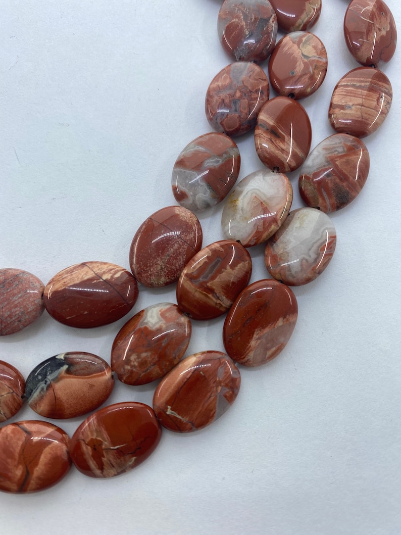 13x18mm Oval Red Bend Jasper Gemstone Beads 15\u201d strand of flat oval Jasper beads Red Jasper with orange pink and white. 22 per strand
