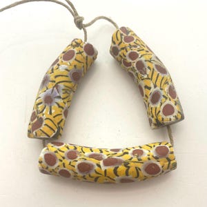Antique Venetian Millefiori African Trade Beads. Strand of 3 “elbow” beads in excellent condition. Approx. 50-55mm in length and 12mm dia.