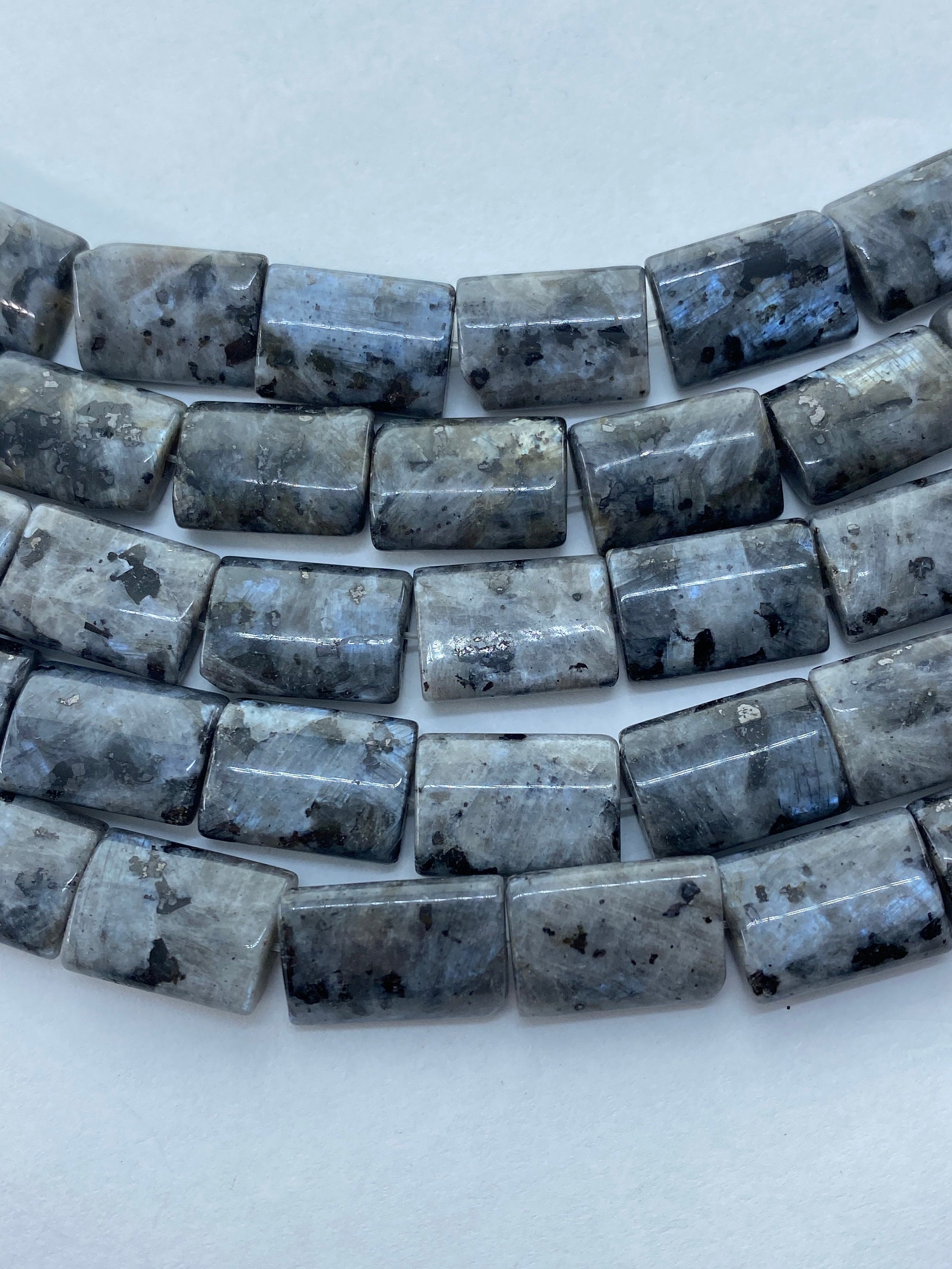 10x14mm Rectangle Black Labrdorite (Larvikite) Gemstone Beads. 15" strand of pillow Black Labradorite beads. Nice neutral with some flash.