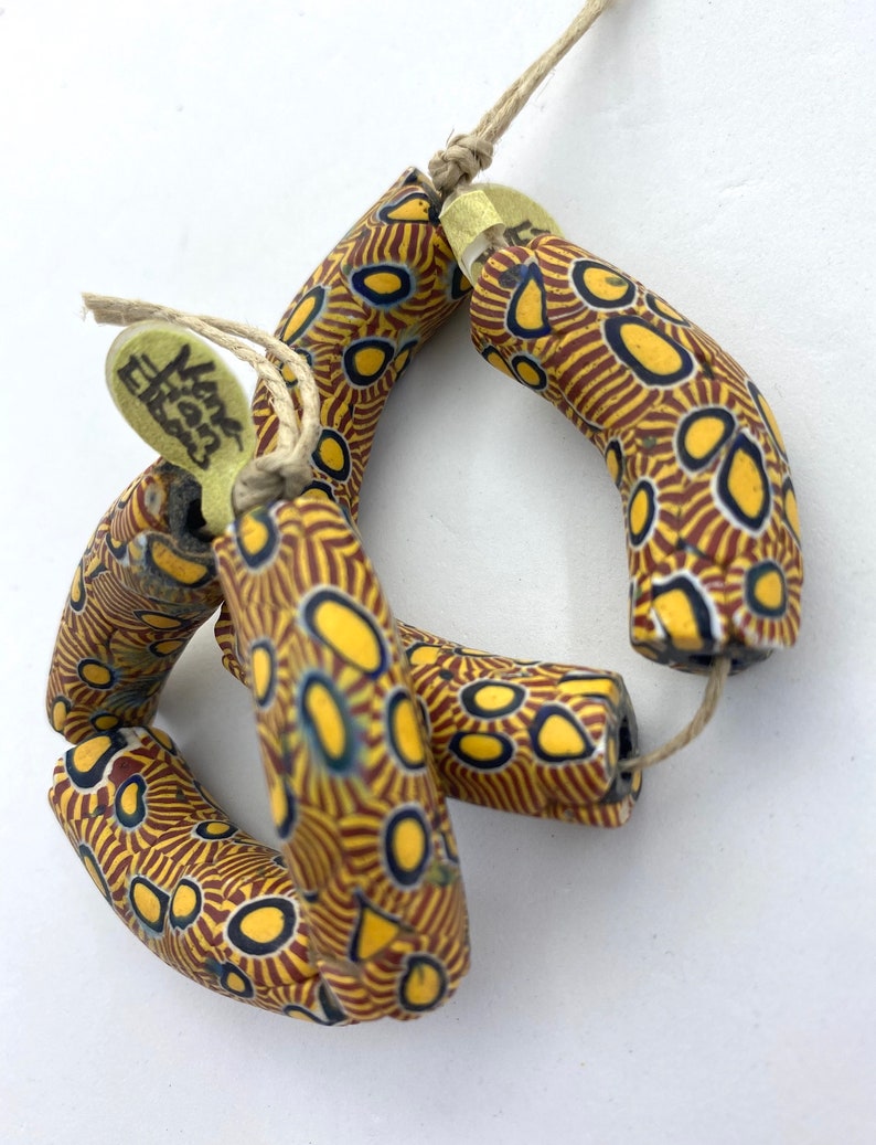 40mm in length and 12mm dia. Strand of 3 \u201celbow\u201d beads in excellent condition Approx Antique Venetian Millefiori African Trade Beads