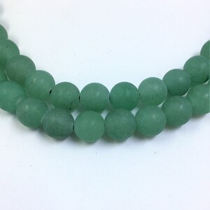 Matte Green Aventurine Gemstone Beads. 8mm round beads on 15 inch strand. Full strand of AAA Grade beads, about 48 per strand.