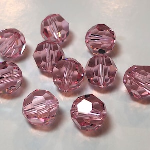 8mm Round Light Rose SWAROVSKI® Crystal Beads #5000. Light Pink genuine Austrian crystal bead. Discounted prices.