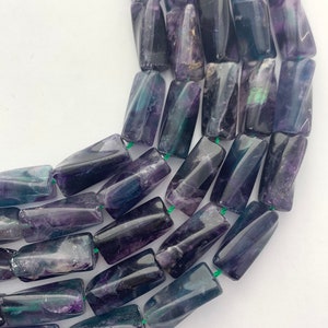 9x20mm reverse tube Fluorite Gemstone beads. 15" strand of high quality beads, 20 per strand. Rainbow Fluorite.