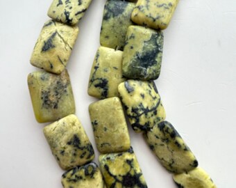 15x20mm Rectangle Yellow Turquoise Gemstone Beads. Full 15" strand of yellow and black rectangles, 21 beads per strand.