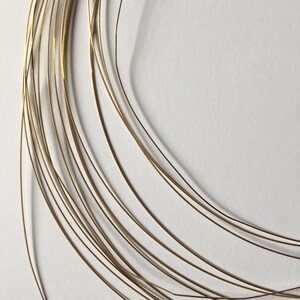 18 gauge 14K Gold Filled Square Half Hard Wire. 5 feet length packages.