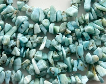 Larimar gemstone chips. Full 16" strand of medium size Larimar beads. Great color, mostly blue and white chips. Lot B.