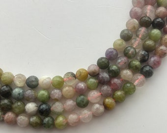 6mm Round Faceted Light Mixed Tourmaline Gemstone Beads. 15" strand of light pink and green Tourmaline beads, about 66 per strand.