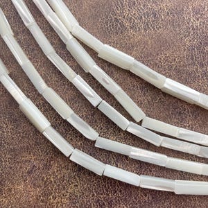 4x13mm Rectangle Natural White Mother of Pearl Gemstone Beads. 15&quot; strand white long cube beads, about 30 per strand.