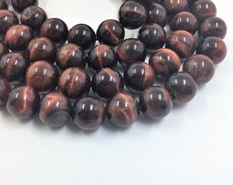 8mm Red Tiger Eye Gemstone Beads. 15" strand of high quality beads, about 48 per strand.