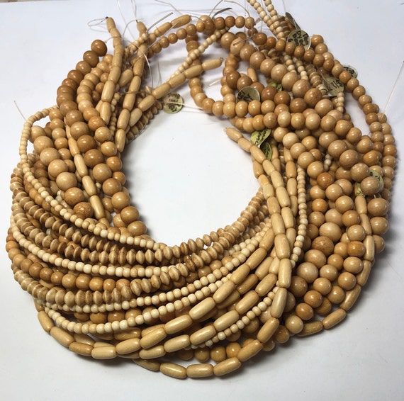 18 strand of Tea Dyed Heishi Bone Beads 3x5mm Antiqued bone beads. Carabao bone beads hand-made in the Philippines