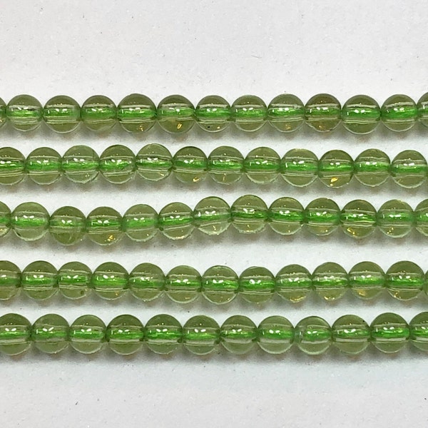 3mm Peridot Gemstone Beads. 15.5" strand of 4mm smooth round beads. Very uniform is size and shape. August birthstone.