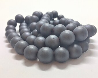 Matte Hematite Gemstone Beads. 12mm round beads on 16 inch strand. Full strand of A/AA Grade beads, roughly 35 beads per strand. Gunmetal
