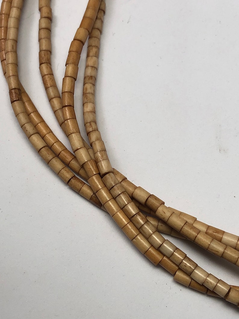 18 strand of Tea Dyed Heishi Bone Beads 3x5mm Antiqued bone beads. Carabao bone beads hand-made in the Philippines
