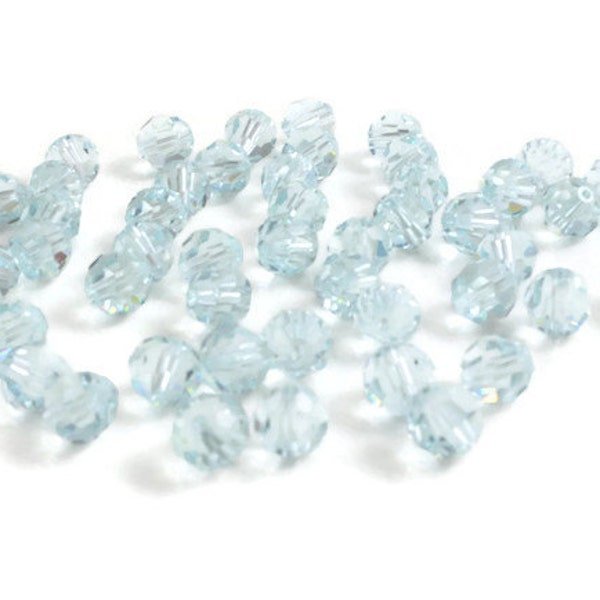 6mm Round light Azore SWAROVSKI® Crystal Beads #5000. Light baby blue color genuine Austrian crystal bead. Discounted price