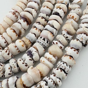 8-10mm Tiger Puka Shell Beads. 15”strands of shell top slices. Hand-made in the Philippines.