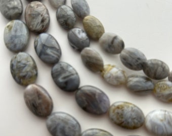 Grey Fossilized Bamboo Jasper flat oval gemstone beads.  Available in 10x14mm and 13x18mm.  Also called Bamboo Agate and Bamboo Leaf.