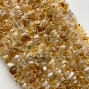 Free Form Citrine Nugget Gemstone Beads. Full 15&quot; strand of 12-14mm semi-round nugget beads, about 56-58 per strand. November birthstone.