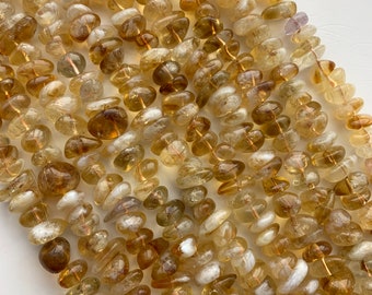 Free Form Citrine Nugget Gemstone Beads. Full 15" strand of 12-14mm semi-round nugget beads, about 56-58 per strand. November birthstone.