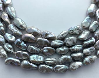 11-14mm grey fresh water pearls  15” strand of baroque rice pearls, approx. 34-38 per strand.