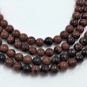 Mahogany Obsidian Gemstone Beads. 4mm round beads on 15 inch strand. Full strand of AAA Grade beads, about 90 beads. Black and Brown gem