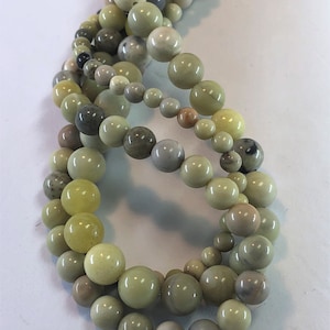 Lemon Chrysoprase Gemstone Beads. 4, 6, and 8mm round beads on 15 inch strand. Full strand of AA Grade beads.
