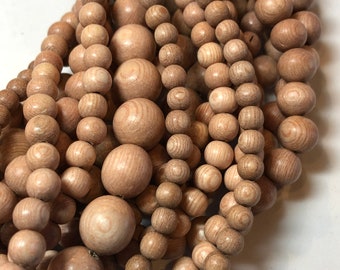 16" strand of Rosewood Round Beads. Natural wood beads made in the Philippines. Mala beads. Very light and organic. Rose wood.