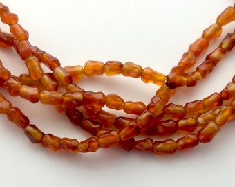 6x8mm Nugget Natural Carnelian Beads. 15" strand of mixed orange nugget beads, about 53 per strand.