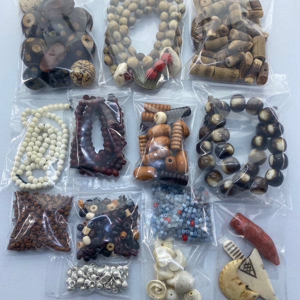 Grab bag!! Wood, bone, seeds and other natural earth tones. Variety of shapes and materials.