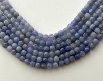 4mm Faceted Cube Tanzanite Gemstone Beads. 15" strand of rare bluish- lavender Tanzanite beads, about 99 per strand.