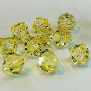 Jonquil 8mm Bicone SWAROVSKI® Crystal Beads #5301 package of 10. Pale Yellow Genuine Austrian Crystal. #5328.
