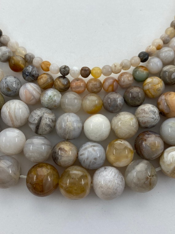 Fossilized Bamboo Beads Available in 4-12mm. Full 15